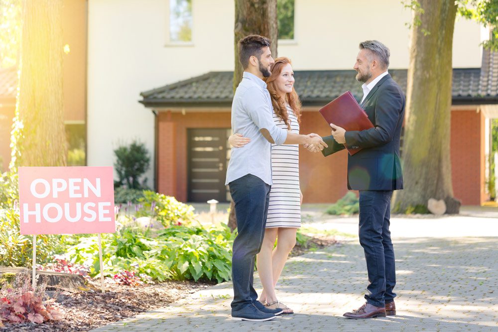 couple going to look at open home
