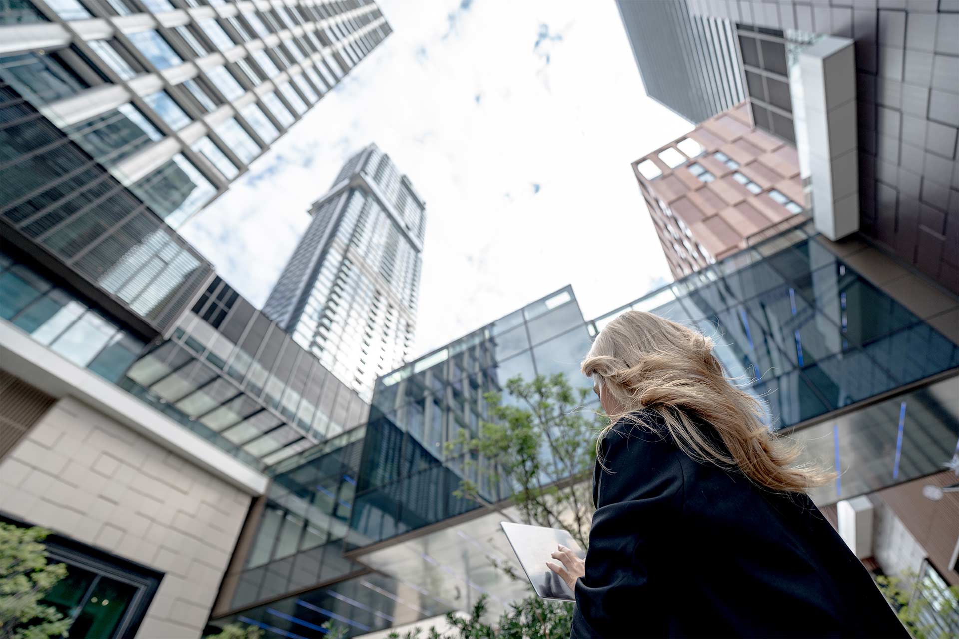 woman working on laptopin city scape